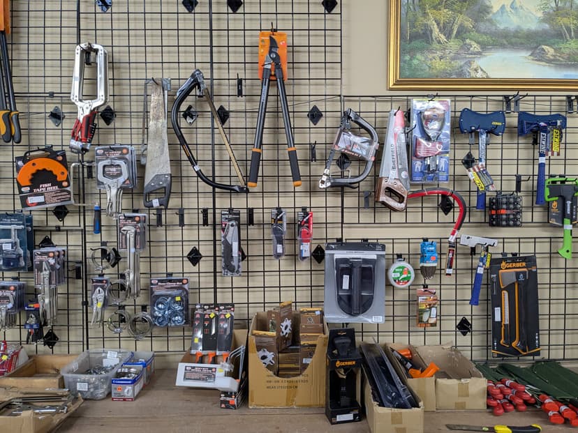 Hardware display with padlocks, carabiners, snap hooks, key rings, and cable locks