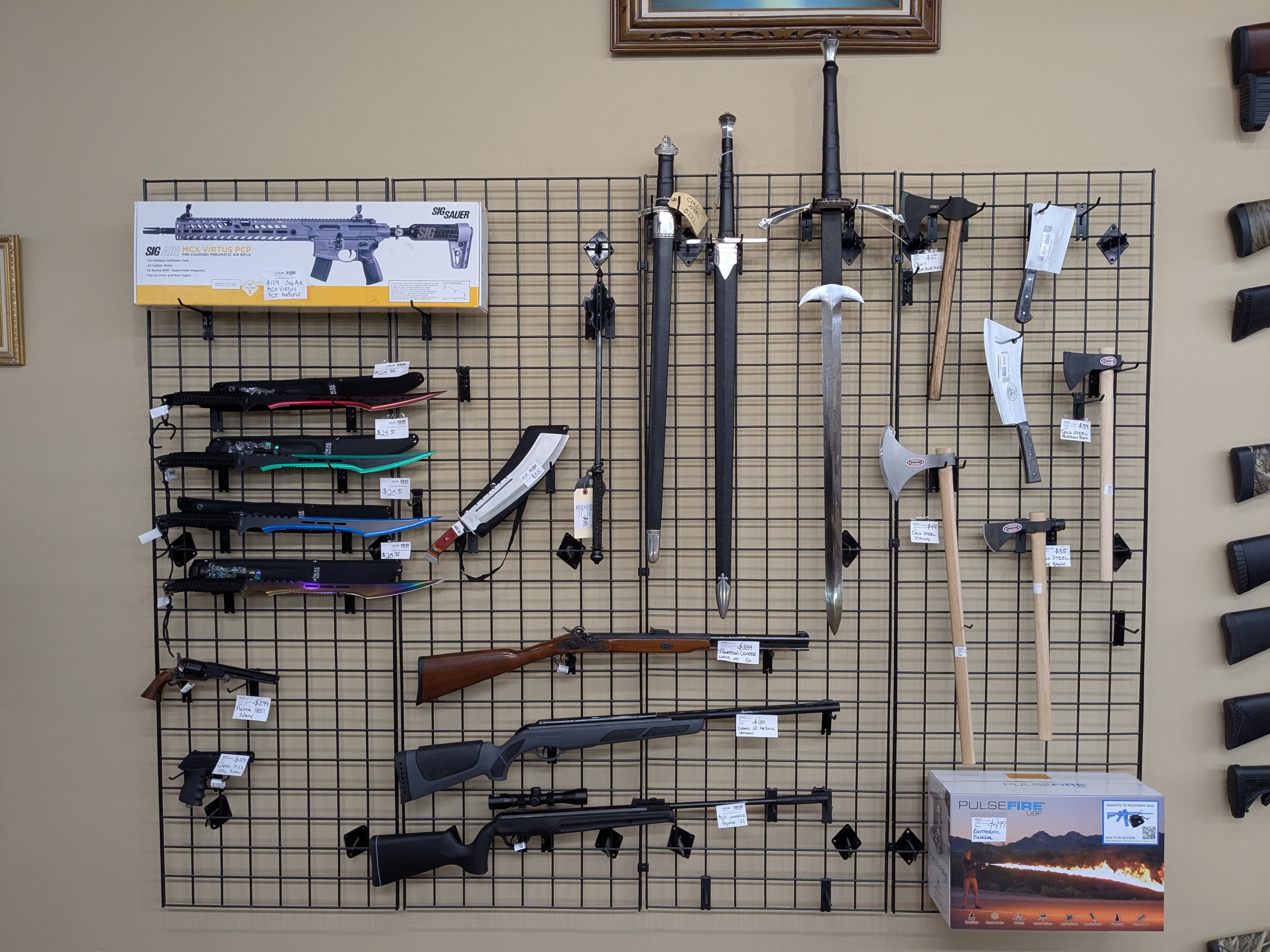 Merchandise displays near the firearms and camping section