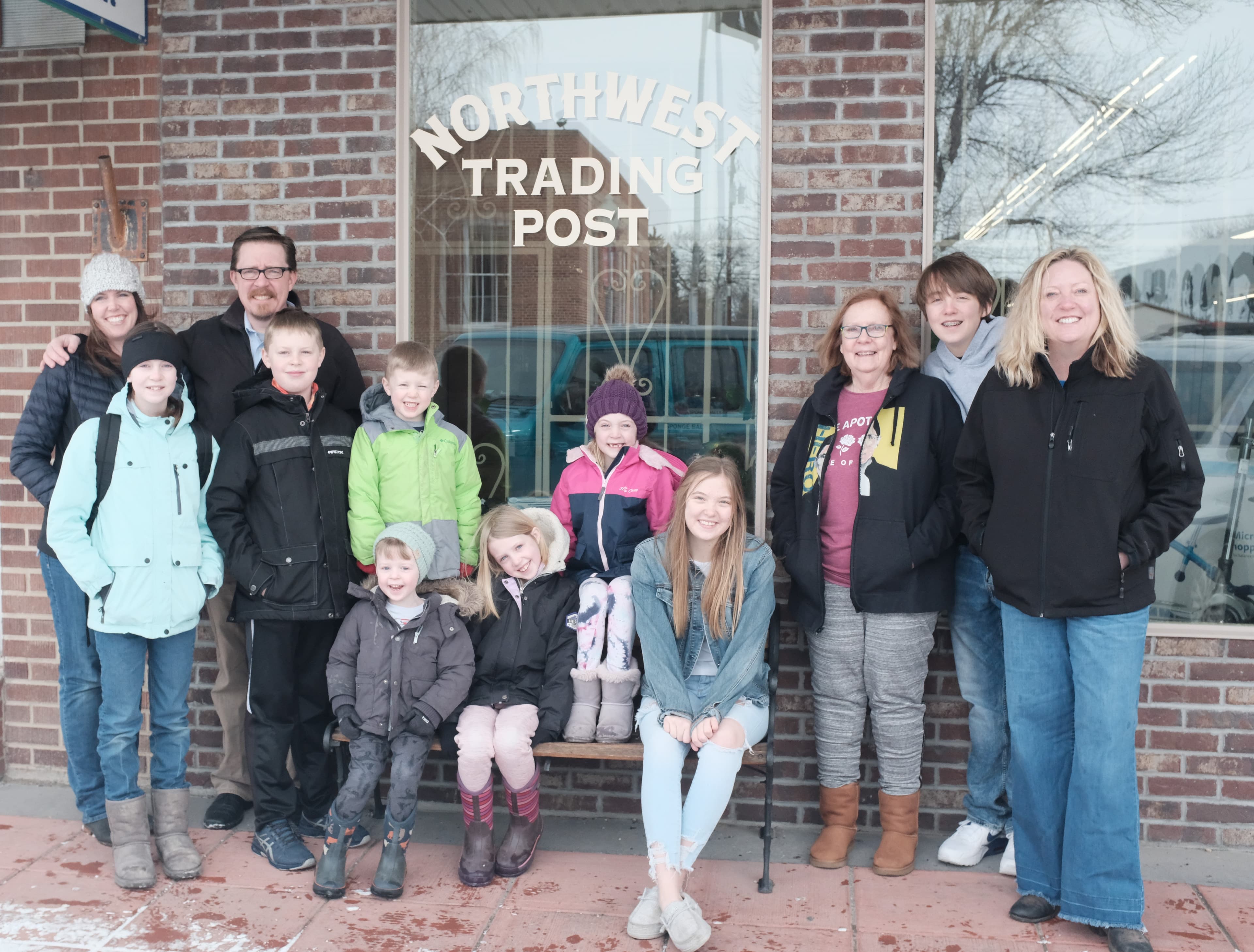 The extended family gathered in front of Northwest Trading Post in downtown Powell, Wyoming