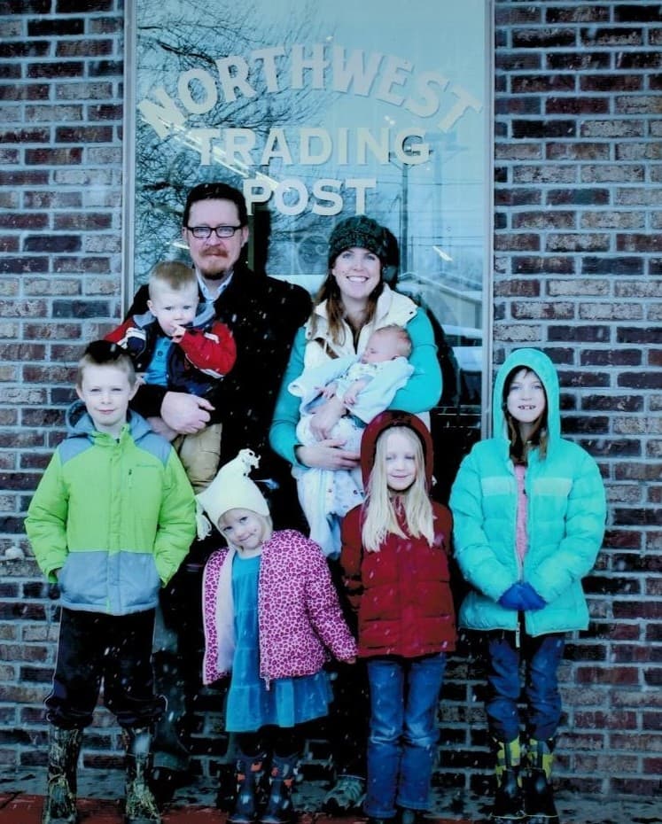Aaron and his family of eight in front of Northwest Trading Post in downtown Powell